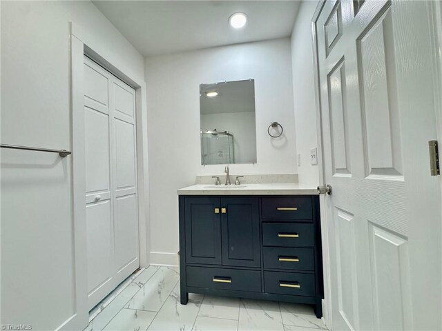 1101 Forrest St, High Point, NC 27262 - bathroom with marble finish flooring, vanity, baseboards, a shower, and recessed lighting