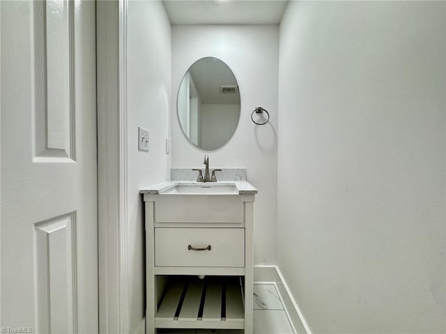 1101 Forrest St, High Point, NC 27262 - bathroom with baseboards and vanity
