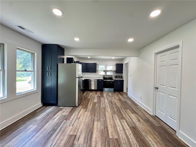 1101 Forrest St, High Point, NC 27262 - kitchen with appliances with stainless steel finishes, dark wood finished floors, healthy amount of natural light, light countertops, and recessed lighting