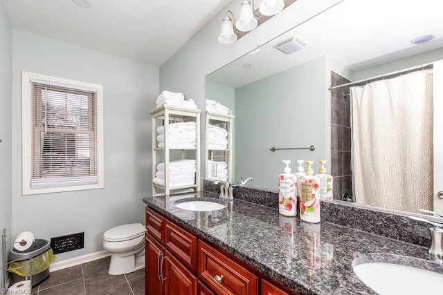 bathroom featuring vanity, tile patterned floors, toilet, and a shower with shower curtain