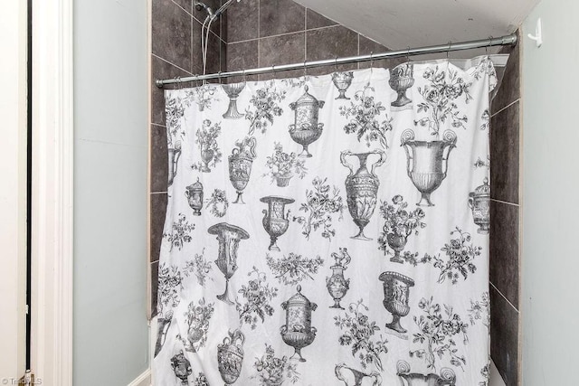 bathroom with a shower with curtain