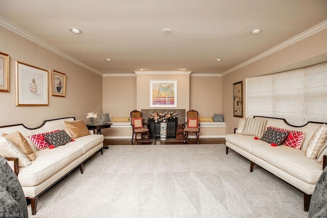 living room with hardwood / wood-style flooring and ornamental molding