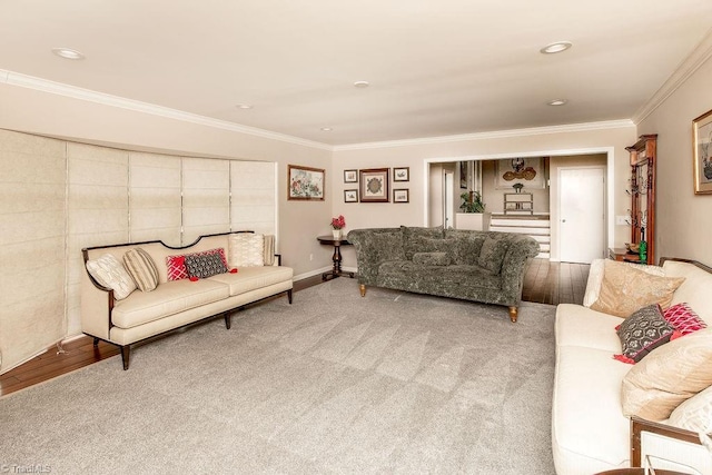 carpeted living room featuring crown molding