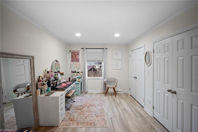 office space with recessed lighting, baseboards, crown molding, and light wood finished floors