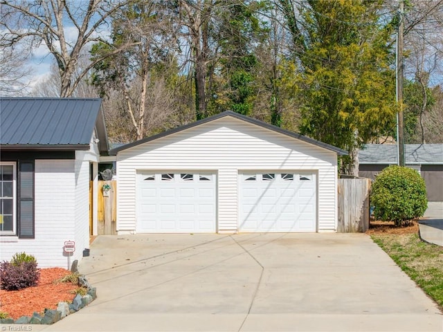 detached garage with fence