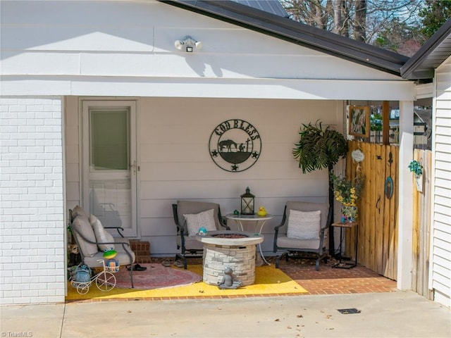 view of patio featuring an outdoor fire pit