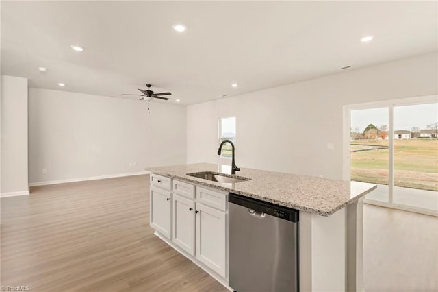 kitchen featuring white cabinetry, sink, ceiling fan, stainless steel dishwasher, and light hardwood / wood-style floors