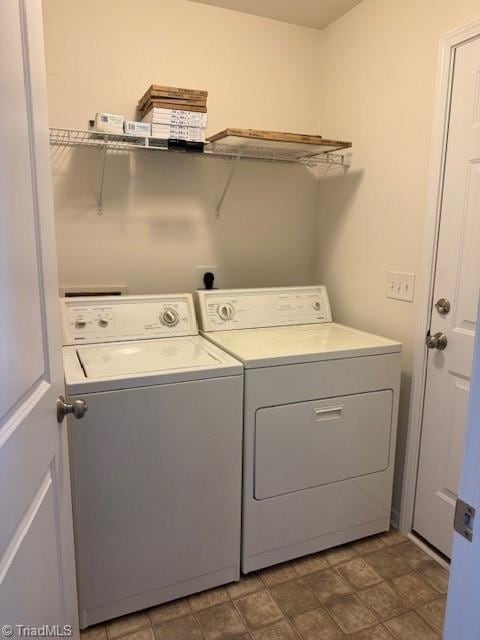 laundry room featuring washing machine and dryer