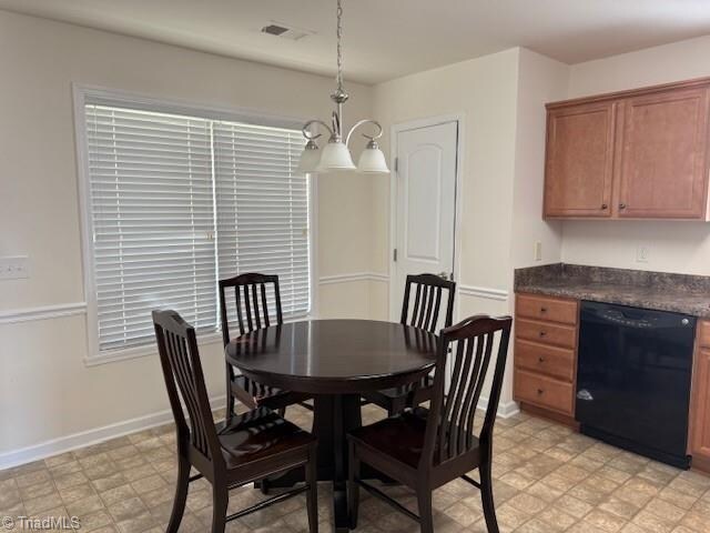 dining room featuring an inviting chandelier