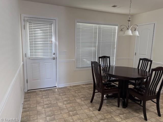 dining room with an inviting chandelier