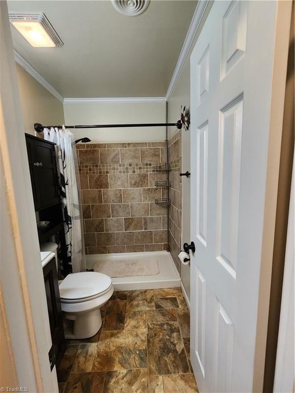 1129 Foxtrot Ct, King, NC 27021 - full bath with crown molding, toilet, stone finish floors, tiled shower, and vanity
