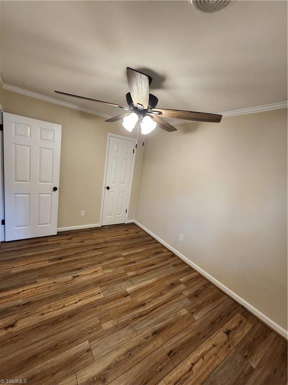 1129 Foxtrot Ct, King, NC 27021 - unfurnished bedroom with baseboards, ornamental molding, wood finished floors, and a ceiling fan