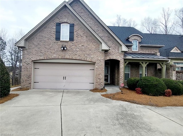 view of front of property with a garage