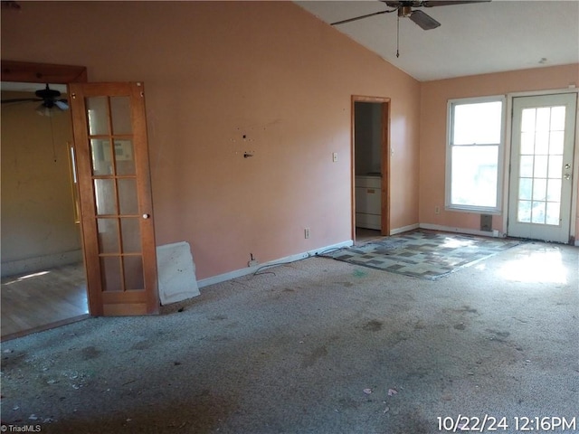 unfurnished room with ceiling fan, carpet flooring, and vaulted ceiling