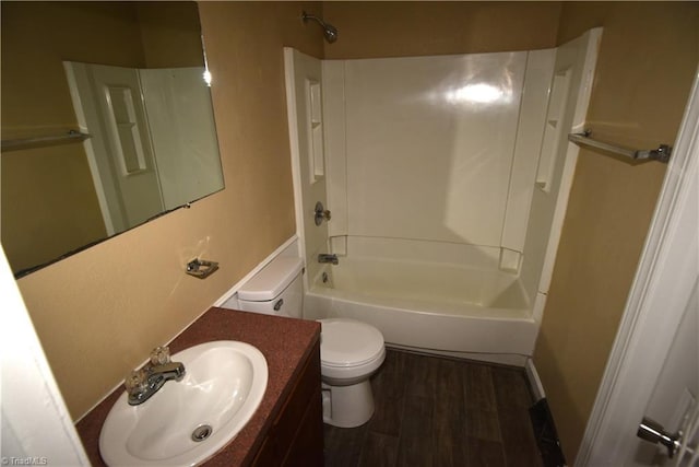 full bathroom featuring hardwood / wood-style flooring, vanity, toilet, and shower / bath combination