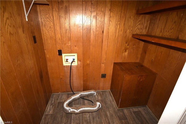 laundry area featuring electric dryer hookup, washer hookup, and wooden walls