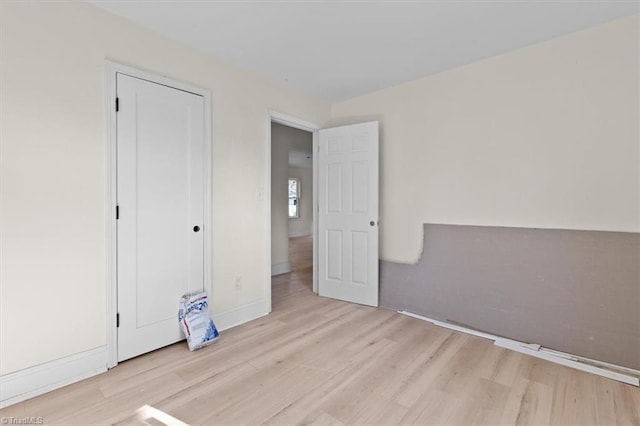 unfurnished bedroom featuring light hardwood / wood-style flooring