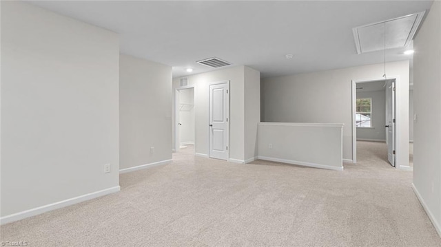 233 Lisa Ln, Winston-Salem, NC 27107 - carpeted spare room with attic access and baseboards