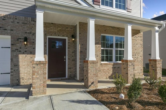 233 Lisa Ln, Winston-Salem, NC 27107 - property entrance with a porch and brick siding