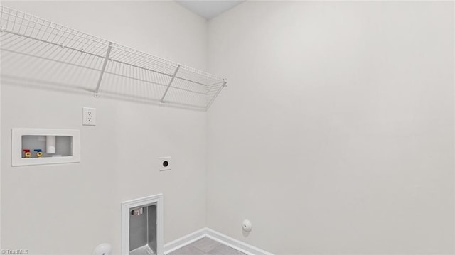233 Lisa Ln, Winston-Salem, NC 27107 - washroom featuring hookup for a gas dryer, electric dryer hookup, hookup for a washing machine, and baseboards