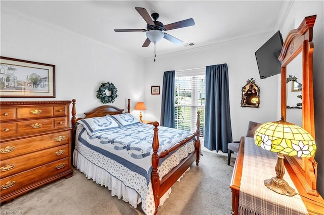 bedroom with light colored carpet and ceiling fan