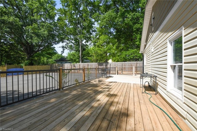 1449 NC Highway 150, Summerfield, NC 27358 - wooden terrace with a fenced backyard