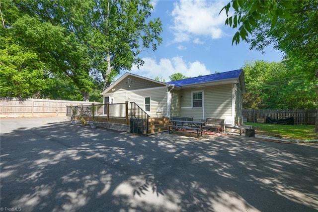 1449 NC Highway 150, Summerfield, NC 27358 - rear view of property featuring a patio