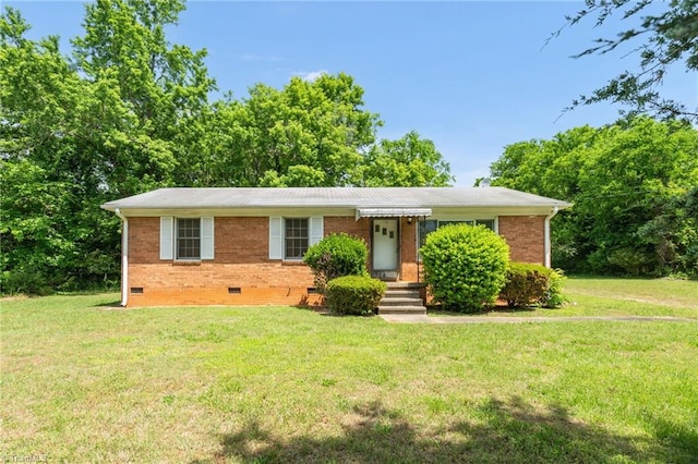 714 W Mckinley St, Mebane, NC 27302 - ranch-style home with crawl space, brick siding, and a front yard
