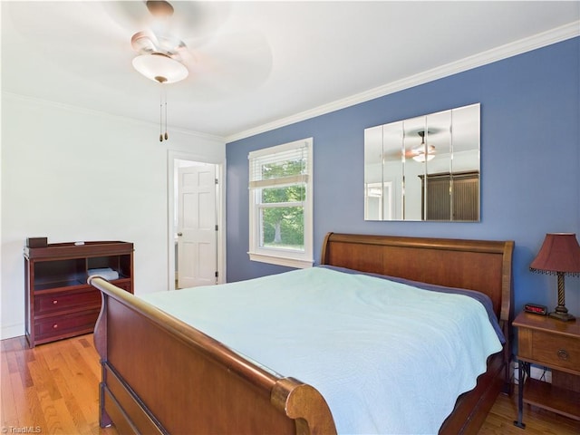 4208 Aberdare Dr, High Point, NC 27265 - bedroom with wood finished floors, crown molding, and ceiling fan