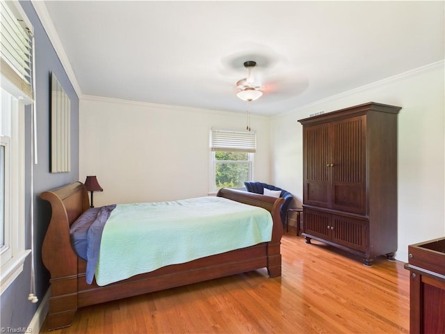 4208 Aberdare Dr, High Point, NC 27265 - bedroom with crown molding and light wood-style flooring