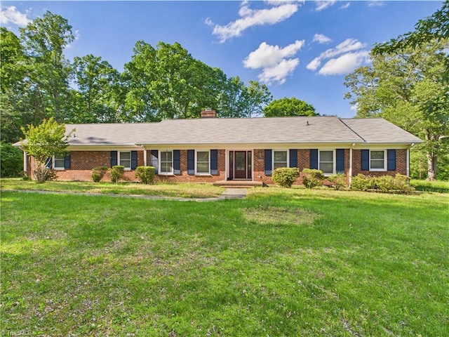 4208 Aberdare Dr, High Point, NC 27265 - ranch-style house with a front lawn, brick siding, and a chimney
