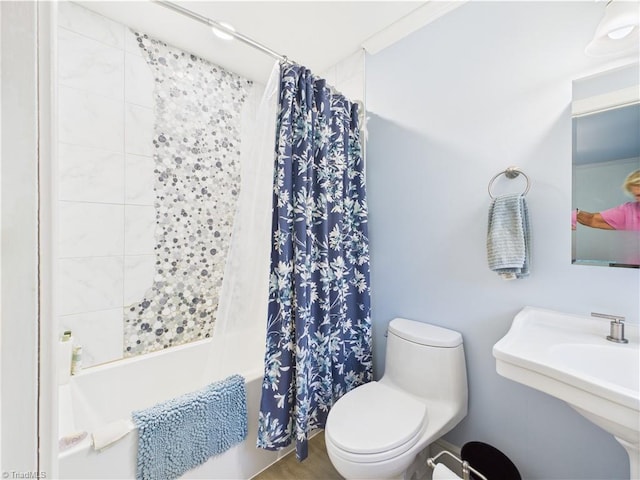 4208 Aberdare Dr, High Point, NC 27265 - bathroom featuring shower / tub combo and toilet