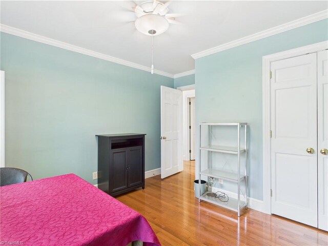 4208 Aberdare Dr, High Point, NC 27265 - bedroom with crown molding, wood finished floors, baseboards, and a ceiling fan