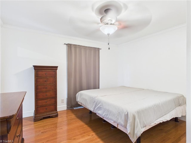 4208 Aberdare Dr, High Point, NC 27265 - bedroom featuring light wood finished floors, ornamental molding, ceiling fan, and baseboards
