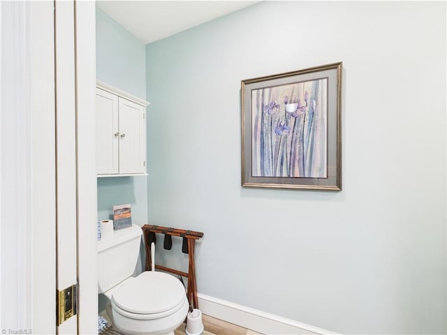 4208 Aberdare Dr, High Point, NC 27265 - bathroom featuring baseboards and toilet