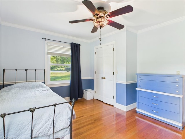4208 Aberdare Dr, High Point, NC 27265 - bedroom featuring wood finished floors, crown molding, baseboards, and a ceiling fan