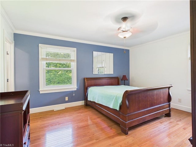 4208 Aberdare Dr, High Point, NC 27265 - bedroom featuring light wood-type flooring, crown molding, and baseboards