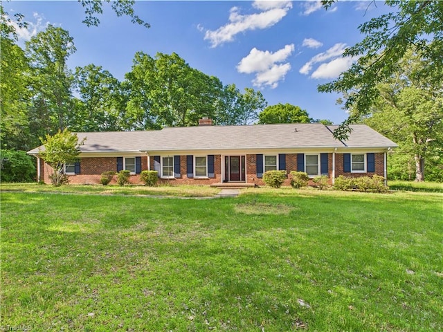 4208 Aberdare Dr, High Point, NC 27265 - single story home featuring a front yard, brick siding, and a chimney