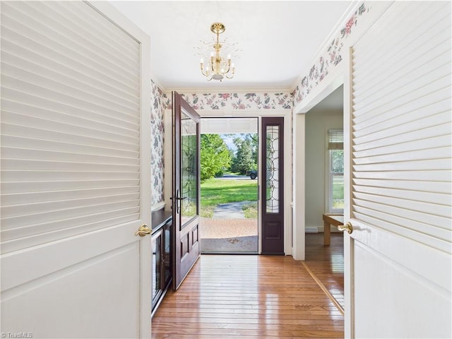 4208 Aberdare Dr, High Point, NC 27265 - entryway with a chandelier and light wood-style floors