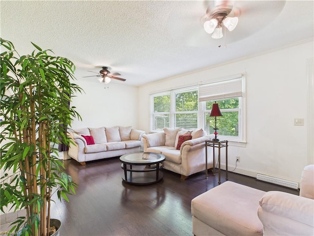 4208 Aberdare Dr, High Point, NC 27265 - living room with a ceiling fan, dark wood finished floors, a baseboard radiator, a textured ceiling, and ornamental molding