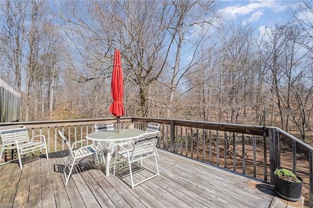 deck featuring outdoor dining space