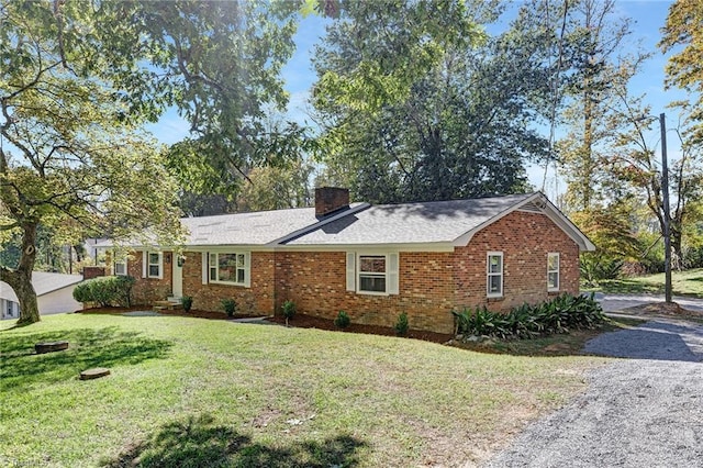 4420 Chebar Dr, Pfafftown, NC 27040 - ranch-style home with a front lawn, a chimney, and brick siding