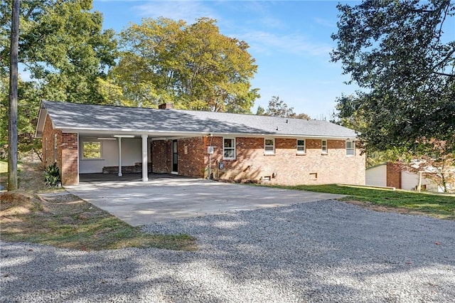 4420 Chebar Dr, Pfafftown, NC 27040 - ranch-style house featuring driveway, brick siding, a carport, and a chimney