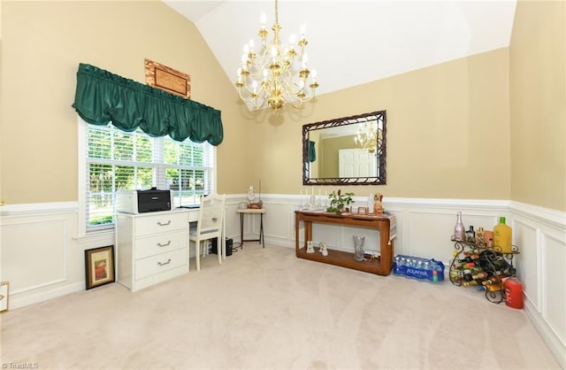 carpeted office space with a chandelier, a wainscoted wall, vaulted ceiling, and a decorative wall