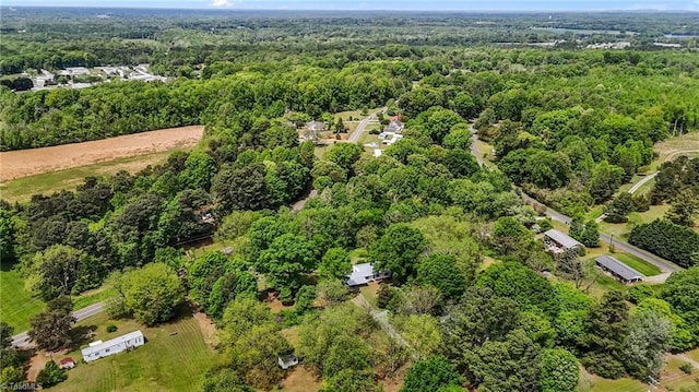 bird's eye view featuring a view of trees
