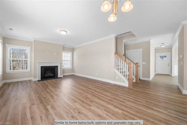 4095 Stallion St Lot 19, High Point, NC 27262 - unfurnished living room with stairway, ornamental molding, light wood-type flooring, baseboards, and a fireplace with flush hearth