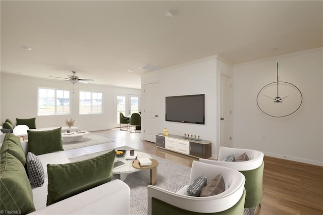 living room featuring wood-type flooring, ceiling fan, and ornamental molding