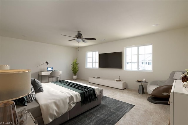 bedroom featuring light colored carpet and ceiling fan