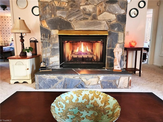 room details with carpet and a fireplace