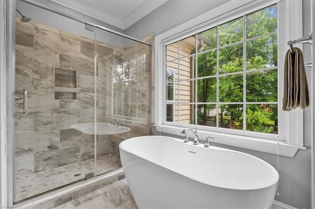 6 Yardarm Ct, Greensboro, NC 27455 - bathroom with crown molding, a soaking tub, a shower stall, and marble finish flooring